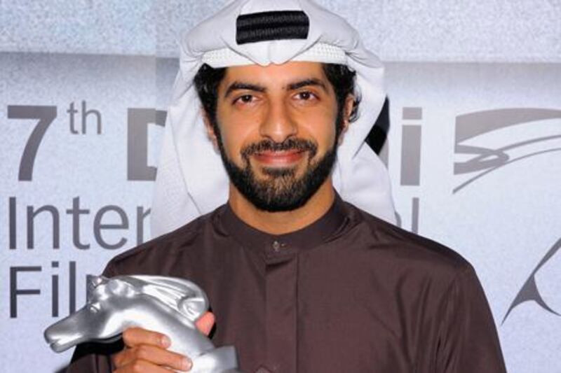 Khalid Al Mahmood at the Dubai International Film Festival in 2010 with his Muhr Emirati Second Prize award for Sabeel. Andrew H Walker / Getty Images for Dubai International Film Festival
