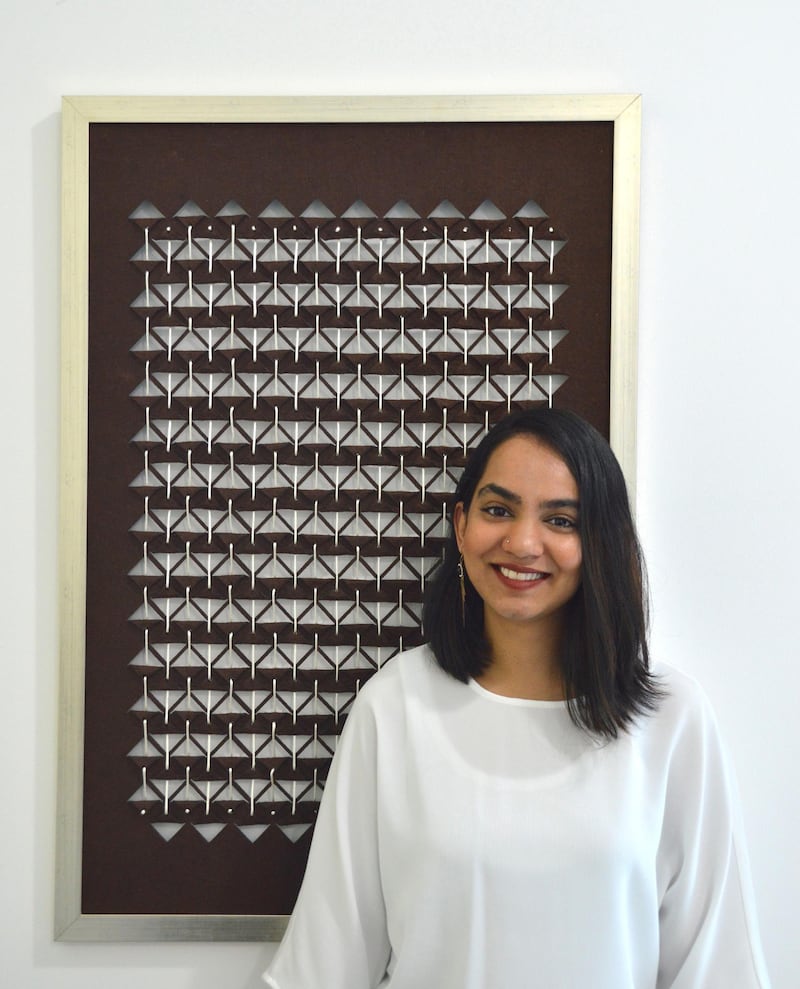 Aditi Patwari with her work 'Structured Chaos 3' from her Dubai Darbaar Collection. Aditi Patwari 