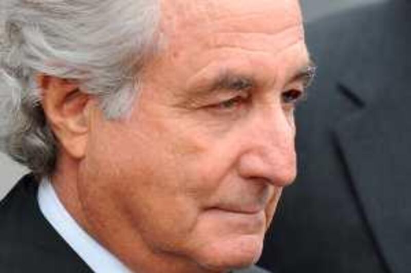 (FILES) Disgraced Wall Street financier Bernard Madoff leaves US Federal Court after a hearing on March 10, 2009 in New York. Madoff has agreed to plead guilty to 11 counts of fraud, his lawyer said in court. The US government is seeking to seize property belonging to disgraced Wall Street financier Bernard Madoff, including some of his wife's assets, prosecutors said on March 16, 2009. A filing in a US district court in New York outlined 18 types of fixed and liquid assets ordered seized by prosecutors. They include "any and all securities funds and other property in account number 126-01070 in the name of Ruth Madoff at COHMAD Securities Corp ... including but not limited to, municipal bonds valued at approximately 45 million dollars."  Bernard Madoff, 70, pleaded guilty Thursday to 11 counts including fraud, perjury, money laundering and theft after US authorities accused him of carrying out one of the biggest financial frauds in history.   AFP PHOTO/Stan HONDA /FILES *** Local Caption ***  Was2215310.jpg