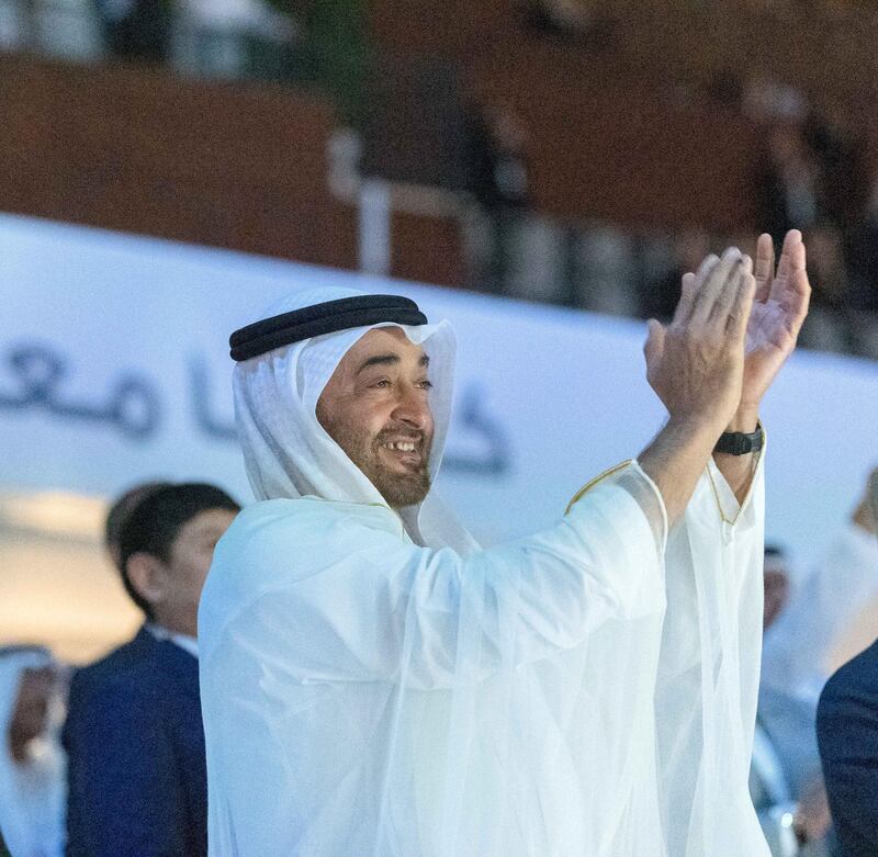 ABU DHABI, UNITED ARAB EMIRATES - March 14, 2019: HH Sheikh Mohamed bin Zayed Al Nahyan, Crown Prince of Abu Dhabi and Deputy Supreme Commander of the UAE Armed Forces (C), applauds the UAE team during the opening ceremony of the Special Olympics World Games Abu Dhabi 2019, at Zayed Sports City. 

( Ali Essa )
---