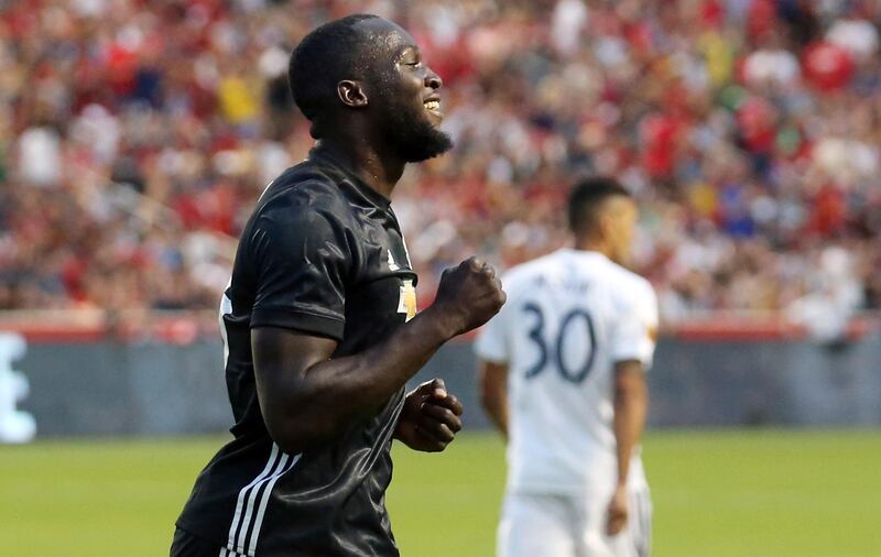 FILE - In this July 17, 2017, file photo, Manchester United forward Romelu Lukaku celebrates after scoring against Real Salt Lake during the first half of a friendly soccer match, in Sandy, Utah. Manchester United is one of a number of European teams visiting the United States in preparation for the season. The team is among those playing in the International Champions Cup in several  U.S. cities this summer. (AP Photo/Rick Bowmer, File)