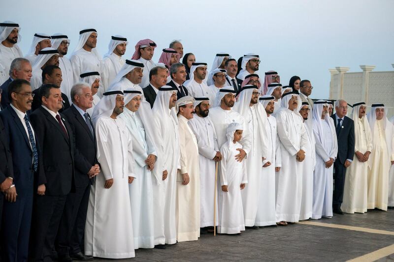 ABU DHABI, UNITED ARAB EMIRATES - October 08, 2018: HH Sheikh Mohamed bin Zayed Al Nahyan, Crown Prince of Abu Dhabi and Deputy Supreme Commander of the UAE Armed Forces (front row 9th L), stands for a photograph with members of "Brainstorm Alliance" initiative, coordinated by The Emirates Center for Strategic Studies and Research (ECSSR), during a Sea Palace barza. Seen with HH Sheikh Tahnoon bin Mohamed Al Nahyan, Ruler's Representative in Al Ain Region (front row 10th L), HH Sheikh Tahnoon bin Mohamed bin Tahnoon Al Nahyan (front C) and HE Dr Jamal Al Suwaidi Director General of the Emirates Center for Strategic Studies and Research (ECSSR) (front row 10th L).

( Hamad Al Kaabi / Crown Prince Court - Abu Dhabi )
---