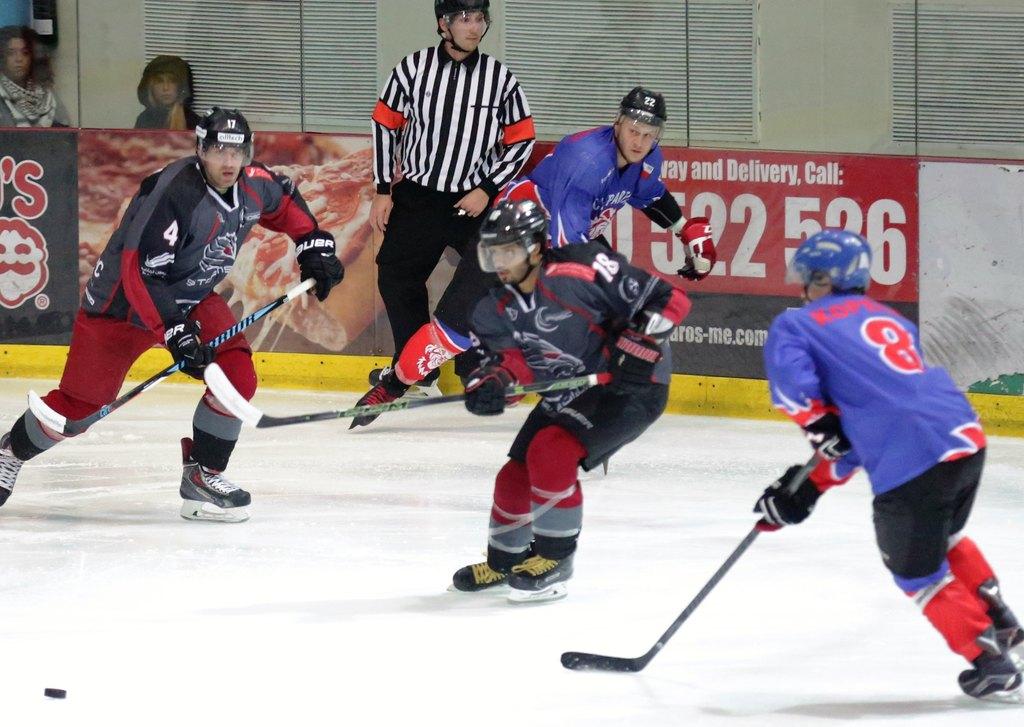 The Abu Dhabi Storms, in grey and red, take on Czech Sparta at the Abu Dhabi Ice Rink on Wednesday, November 16, 2016. Photo courtesy Abu Dhabi Ice Sports Club