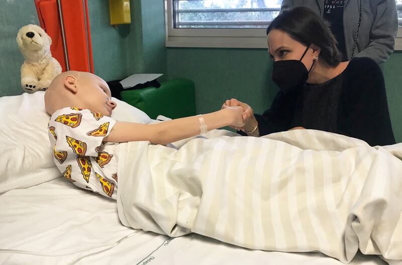 Jolie visits a young patient from Ukraine at the Bambino Gesu Paediatric Hospital in Rome, Italy. Reuters 