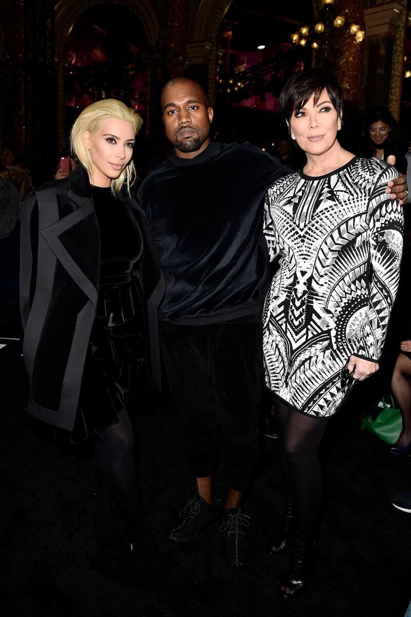 PARIS, FRANCE - MARCH 05:  Kim Kardashian, Kanye West and Kris Jenner attend the Balmain show as part of the Paris Fashion Week Womenswear Fall/Winter 2015/2016 on March 5, 2015 in Paris, France.  (Photo by Pascal Le Segretain/Getty Images)