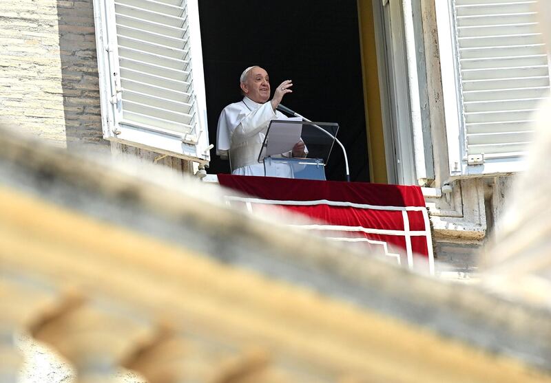 Pope Francis addresses pilgrims gathered in St. Peter's Square at the Vatican as he arrives to deliver his Sunday Angelus prayer on July 12, 2020. Pope Francis said he was "very distressed" over Turkey's decision to convert the Byzantine-era monument Hagia Sophia back into a mosque. "My thoughts go to Istanbul. I'm thinking about Hagia Sophia. I am very distressed," the pope said. / AFP / Vincenzo PINTO
