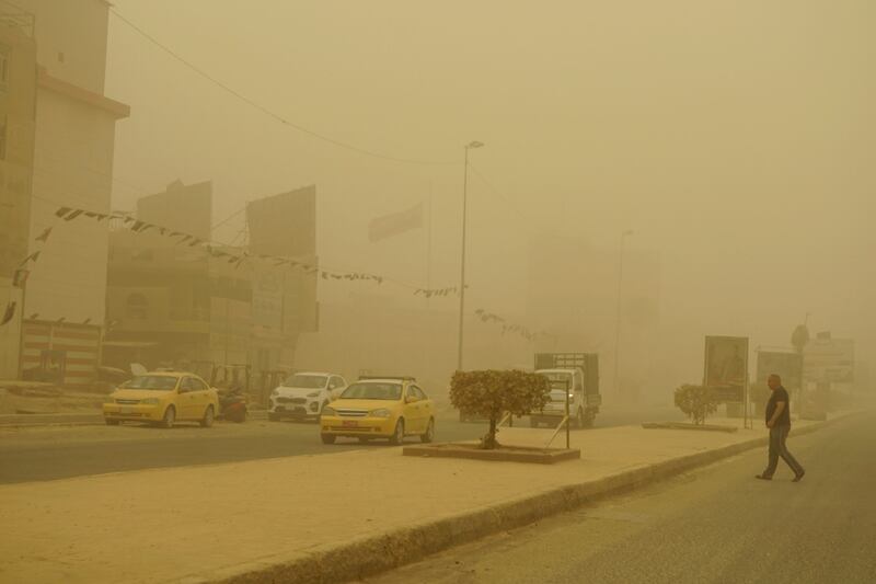 Dust fills the air during a sandstorm in Baghdad. AFP