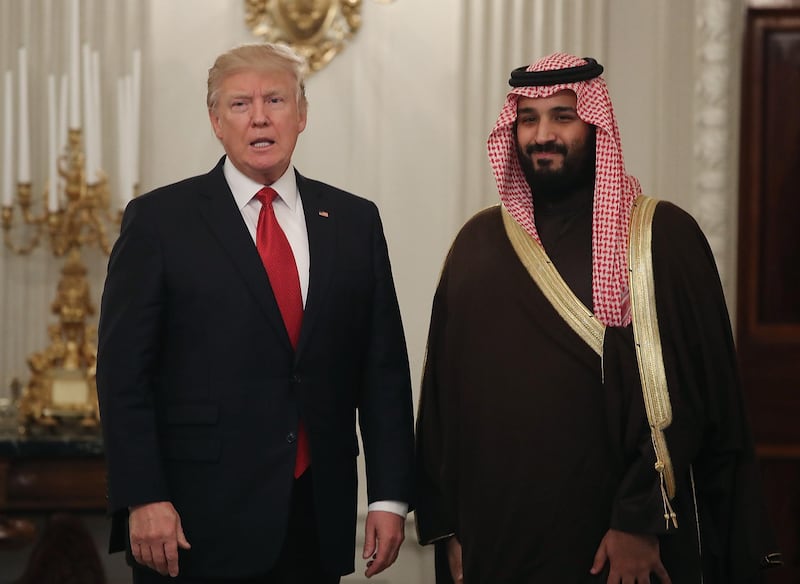 WASHINGTON, DC - MARCH 14:  U.S. President Donald Trump (L) and Mohammed bin Salman, Deputy Crown Prince and Minister of Defense of the Kingdom of Saudi Arabia, walk into the State Dining Room to have lunch, at the White House, March 14, 2017 in Washington, DC.  (Photo by Mark Wilson/Getty Images)