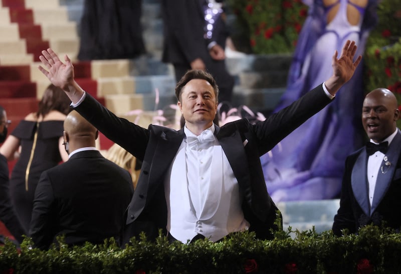 Mr Musk waves at the Met Gala. Reuters