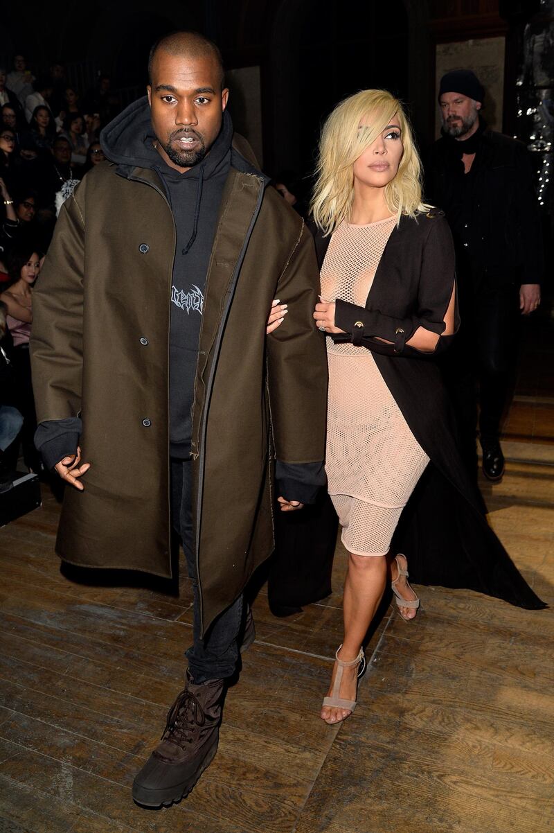 PARIS, FRANCE - MARCH 05:  Kanye West and Kim Kardashian attend the Lanvin show as part of the Paris Fashion Week Womenswear Fall/Winter 2015/2016 on March 5, 2015 in Paris, France.  (Photo by Pascal Le Segretain/Getty Images)