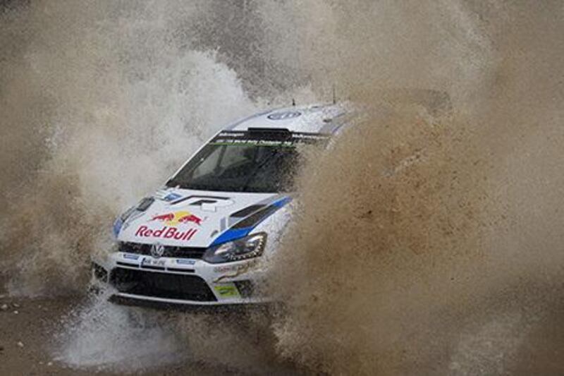 Finnish driver Jari-Matti Latvala steers his Volkswagen Polo R WRC with his compatriot co-driver Miikka Anttila during the 3rd stage of the WRC Argentina 2014 near Agua de Oro, Cordoba, Argentina. Diego Lima / AFP
