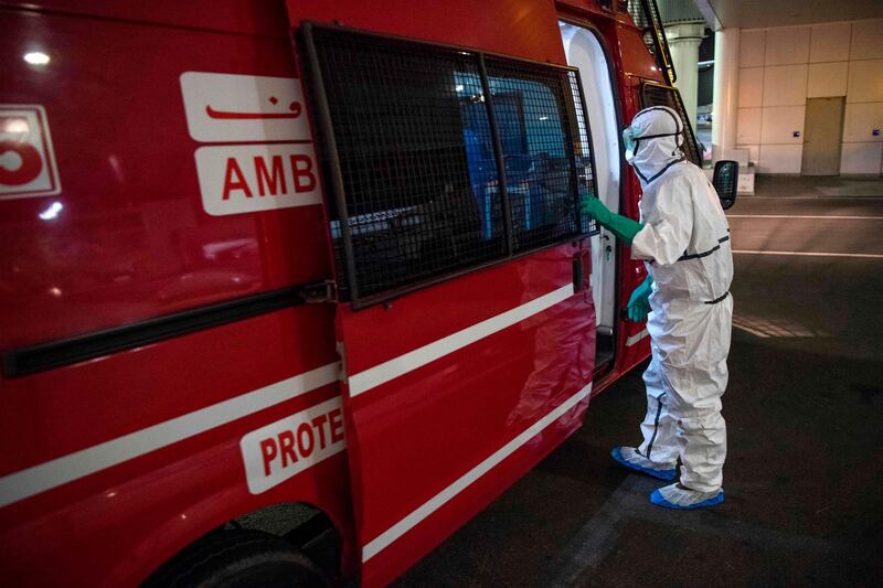 Moroccan health workers are pictured at Casablanca Mohammed V International Airport on March 3, 2020 during measures against the coronavirus COVID-19. AFP