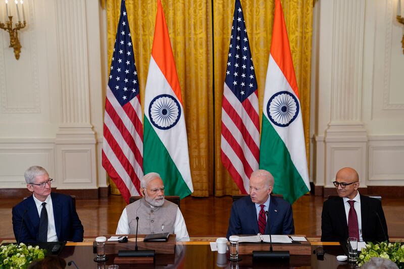 US President Joe Biden speaks during a meeting with Mr. Modi and American and Indian business leaders in the East Room of the White House. From left, Tim Cook, CEO of Apple, Mr. Modi, Mr. Biden, and Satya Nadella, CEO of Microsoft. AP Photo