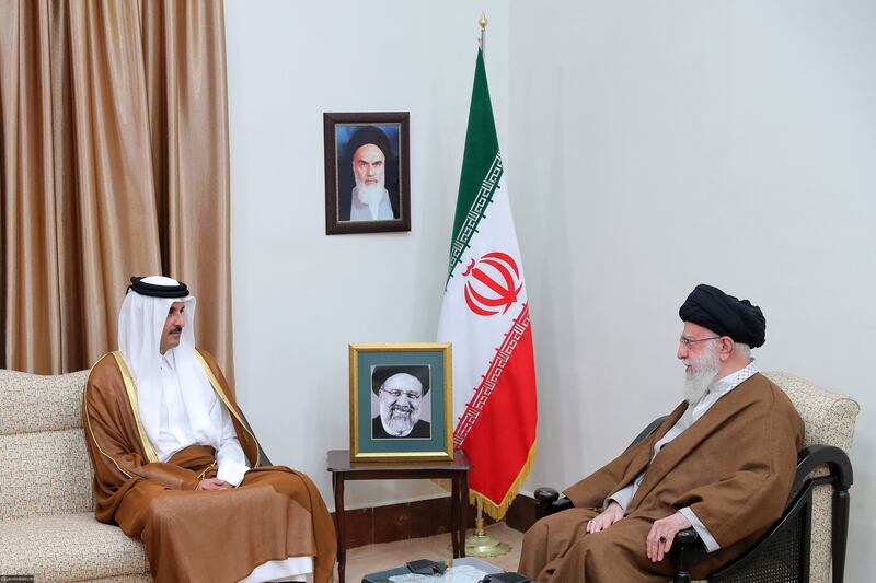 Mr Khamenei meets Qatar's Emir Sheikh Tamim. AFP