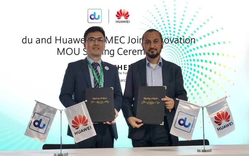 Saleem AlBlooshi, right, and Richard Liu at the signing ceremony between EITC and Huawei during the Mobile World Congress in Barcelona. Photo: Huawei