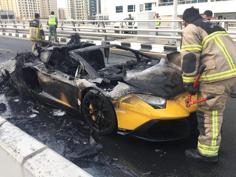 Civil Defence check the Lamborghini Aventador that caught fire in the Dubai Marina. Courtesy James Vincent