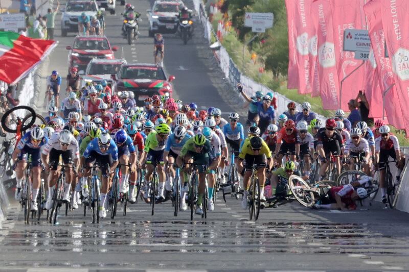 Riders crash before the finish line during stage one of the sixth UAE Tour, from Al Dhafra Walk to Liwa. AFP