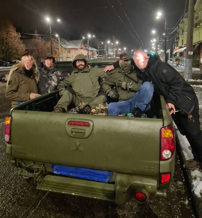 Mr Haynes with colleagues in Ukraine. Photo: Barry Haynes