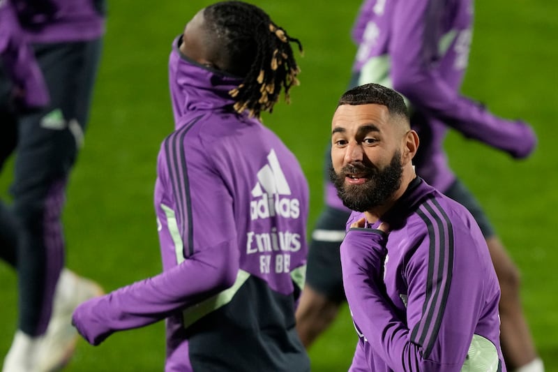 Real Madrid's Karim Benzema warms up during a training session in Riyadh. Real will play the Spanish Super Cup semi-final against Valencia on Wednesday at the King Fahd Stadium in Riyadh. AP