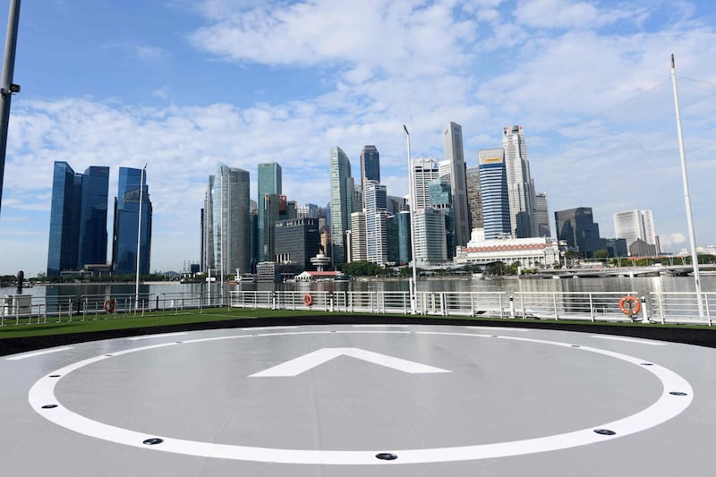 The VoloPort prototype launch pad is seen at Marina Bay against the city skyline where the Volocopter unmanned air taxi transport test flight will take place during the 26th Intelligent Transport Systems World Congress (ITSWC) in Singapore.  AFP