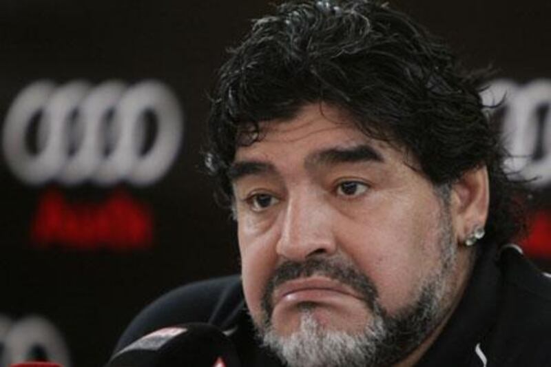 Diego Maradona faces the media while manager of Al Wasl.