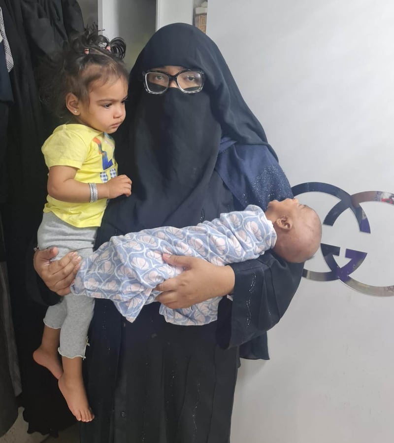 Sharjah resident Aziza Hakeem needs formula milk, food for her young children and nappies. The family was forced to flee from their villa in the Al Sabkha area when the water gushed in the day after the rains last week. Photo: Hakeem family 