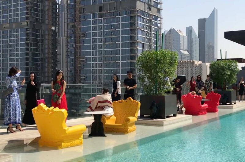 A group from China takes a closer look at a Dubai property in 2018. The safety and connectivity of the emirate are key factors for investors. Photo: Driven Properties 