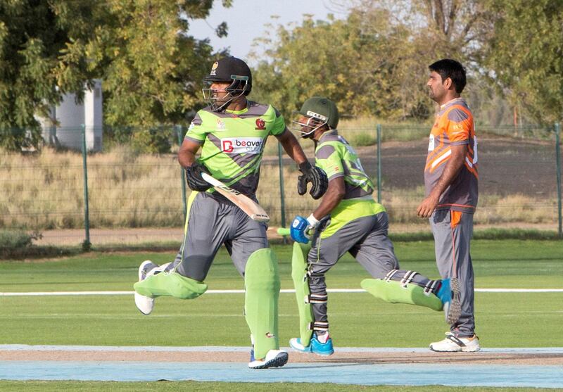 Al Ain, United Arab Emirates - Mohammed Usman of Dragons team (left ) at the cricket match between Dragons vs Chennai at Al Ain Cricket Club, Equestrian Shooting & Golf Club.  Ruel Pableo for The National 