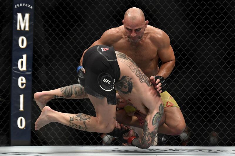 Glover Teixeira (top) of Brazil fights Anthony Smith. Getty