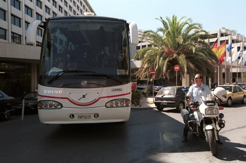 A police escort prepares to take the Manchester United team bus to Athens International Airport after their Champions League game against Olympiakos was called off in September, 2001. Getty