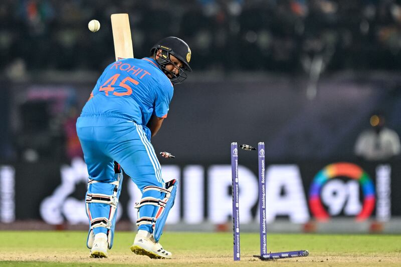 India's captain Rohit Sharma is clean bowled by New Zealand's Lockie Ferguson. AFP