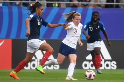 France's defender Maelle Lakrar (L) vies with England's midfielder Lauren Hemp during the Women's U20 World Cup play-off for third place football match between France and England on August 24, 2018, at the La Rabine Stadium in Vannes, western France. (Photo by FRED TANNEAU / AFP)