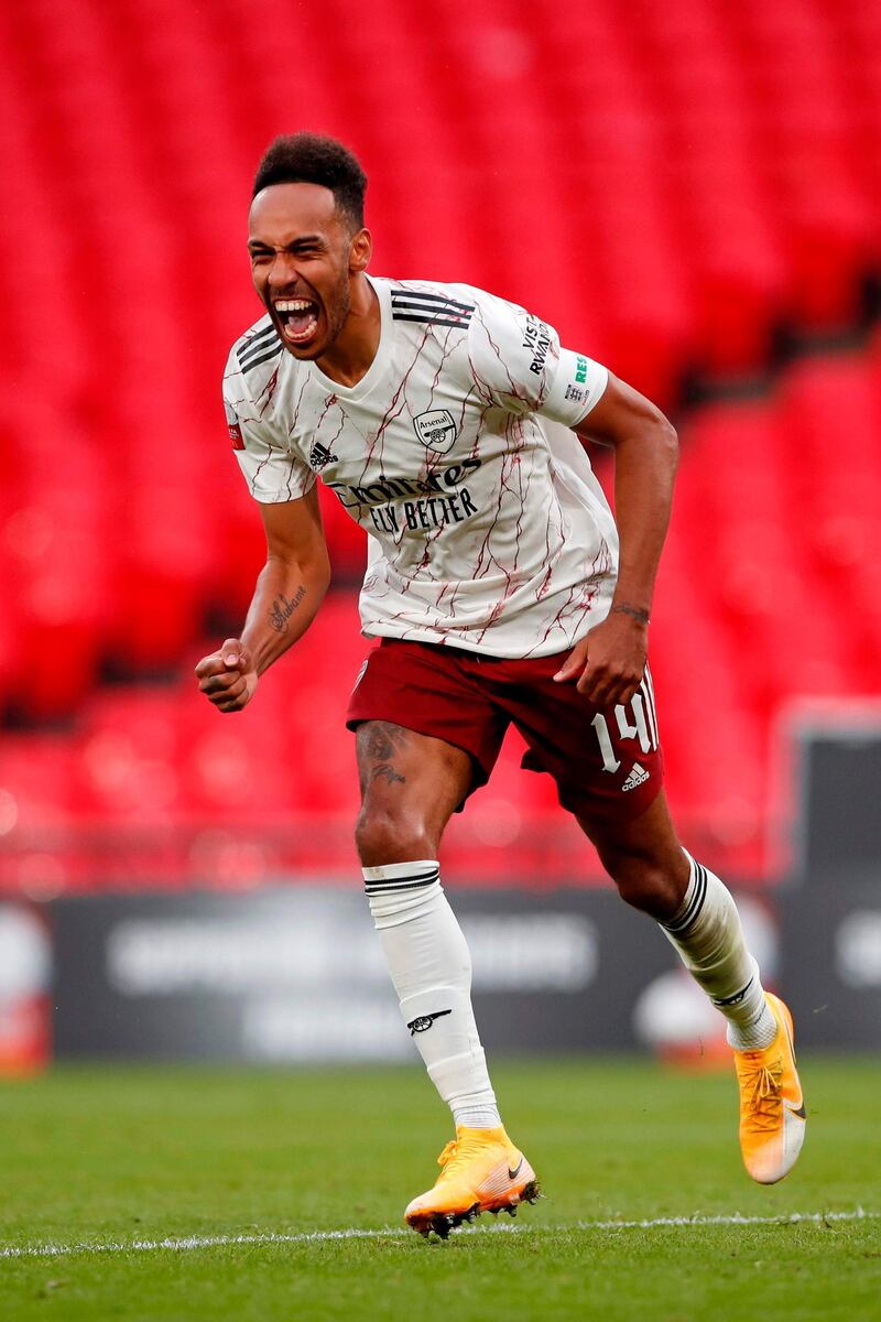 Pierre-Emerick Aubameyang celebrates after scoring the winning spot-kick in the shootout. AFP