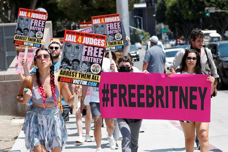 People protest in support of pop star Britney Spears on the day of a conservatorship case hearing at Stanley Mosk Courthouse in Los Angeles, California.