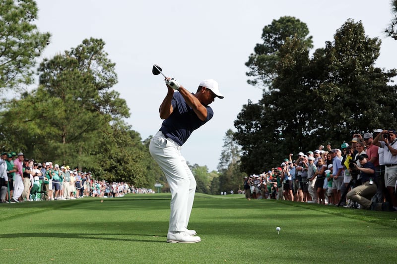 Tiger Woods plays his shot from the ninth tee during a practice round prior to The Masters. Getty