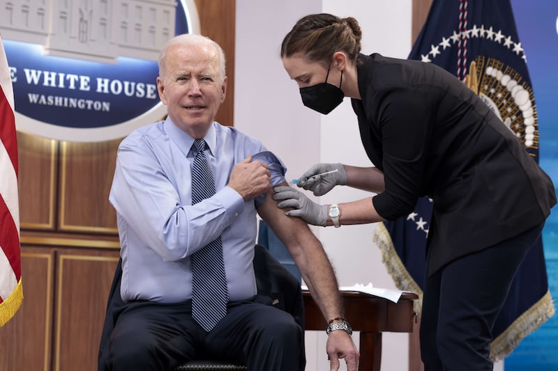 US President Joe Biden receives a fourth dose of the Pfizer-BioNTech Covid-19 vaccine on March 30, 2022. AFP