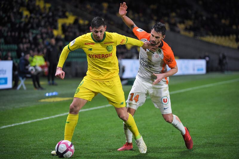 Monpellier's French defender Damien Le Tallec (R) vies with Nantes' Argentinian forward Emiliano Sala during the French L1 match between Nantes and Montpellier at the La Beaujoire stadium in Nantes on January 8, 2019.  AFP