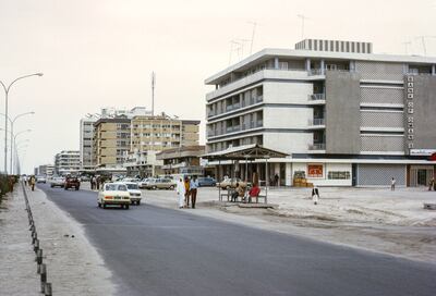 Buildings, including a Bank of Oman branch, on a street in Abu Dhabi in March 1972. ©Charles O. Cecil / Cecil Images