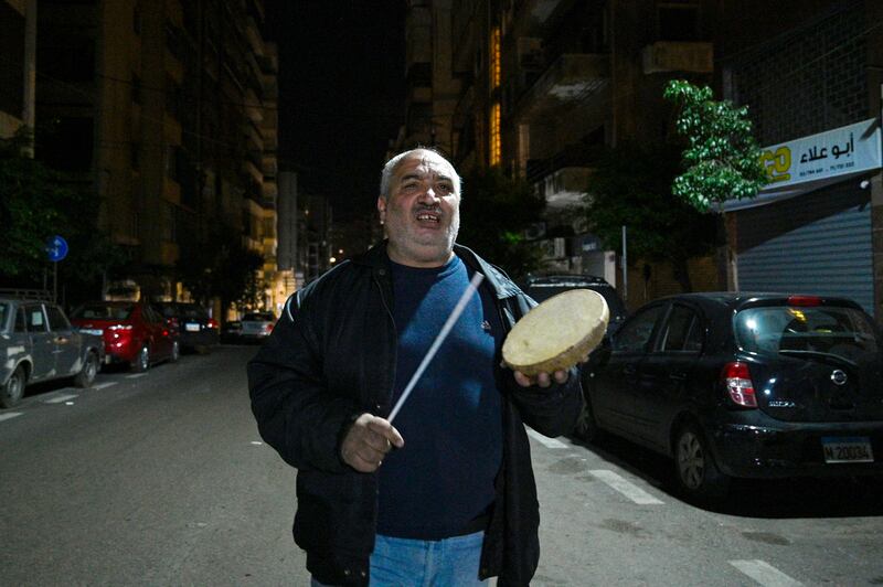 A Lebanese drummer makes his rounds waking people for suhoor, the meal taken during Ramadan before sunrise prayers, in Beirut. EPA