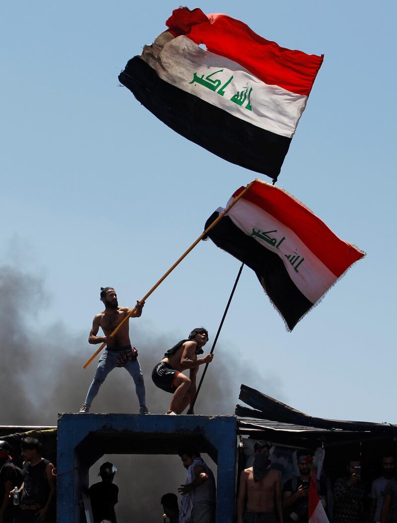 Demonstrators gesture as they take part in the ongoing anti-government protests after newly-appointed Iraqi Prime Minister Mustafa Kadhimi called for the release of all detained protesters, at Al Jumhuriya bridge in Baghdad, Iraq. REUTERS