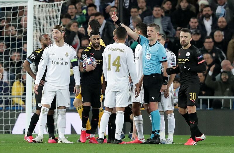 Referee Daniele Orsato shows Sergio Ramos the red card dafter his foul on Jesus. Getty