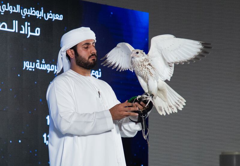 A falcon worth Dh600,000 is auctioned off at the Abu Dhabi International Hunting and Equestrian Exhibition at Adnec, Abu Dhabi on Friday. Ruel Pableo for The National