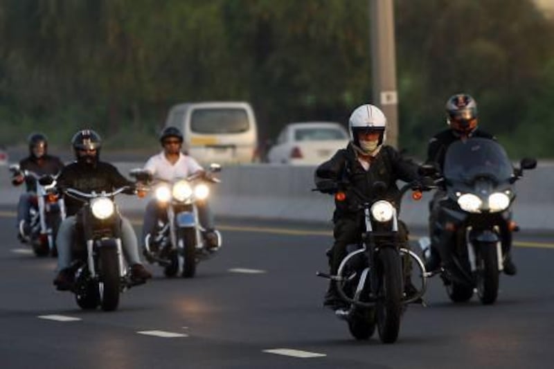 Dubai, United Arab Emirates- June 24,  2011:  UAE  Harley Davidson  riders gather at the gas station in Dubai for their morning ride.  ( Satish Kumar / The National )