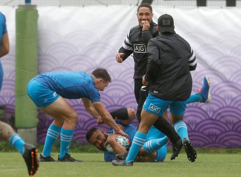 New Zealand's Nepo Laulala falls to the ground during training in Tokyo. AP