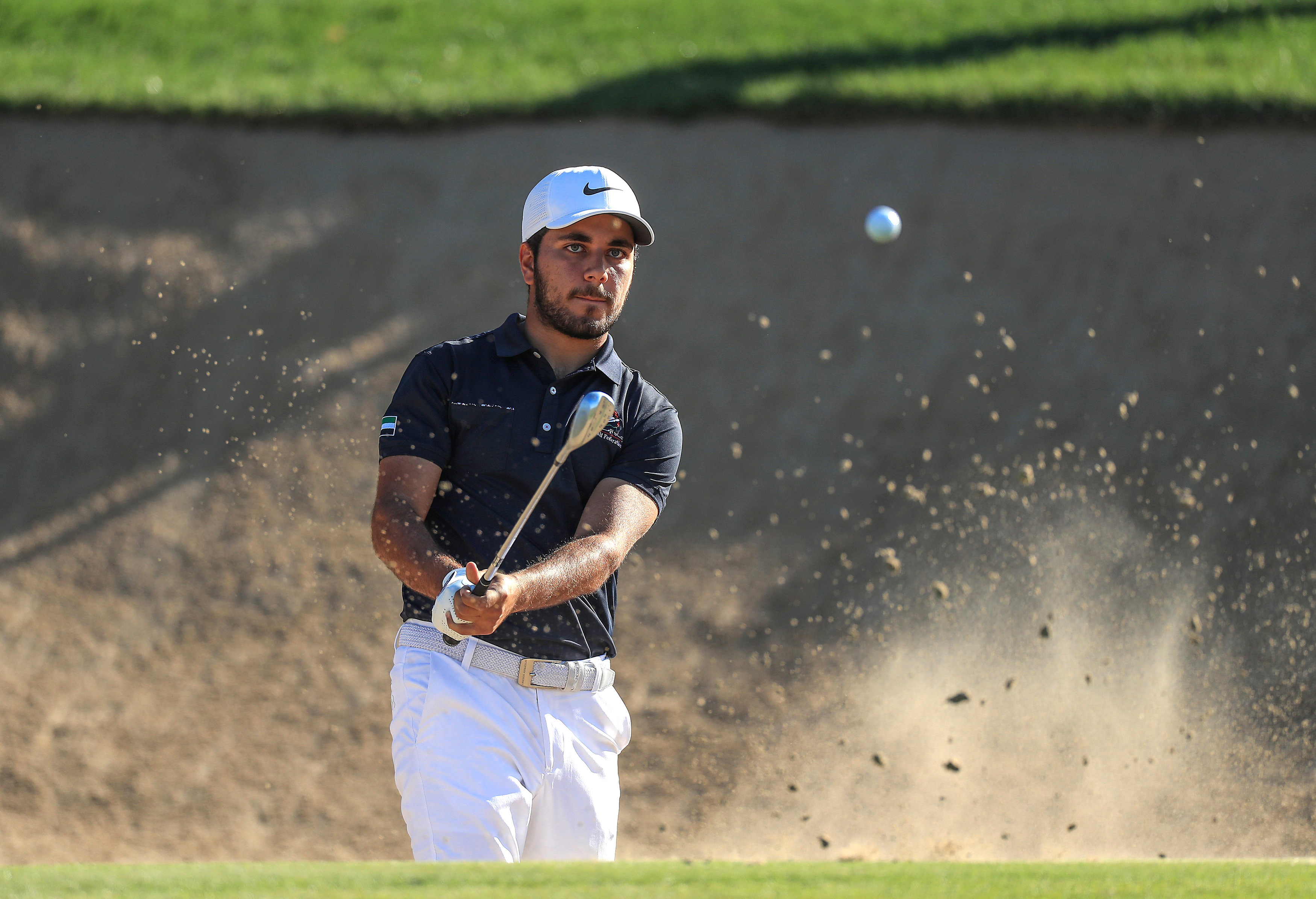 ABU DHABI, UNITED ARAB EMIRATES - JANUARY 17: Ahmed Skaik of the United Arab Emirates plays his fourth shot on the second hole during the second round of the Abu Dhabi HSBC Championship at Abu Dhabi Golf Club on January 17, 2020 in Abu Dhabi, United Arab Emirates. (Photo by David Cannon/Getty Images)