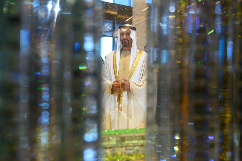 Sheikh Mohamed views a model of the Regal Heights Hotel during the hotel's inauguration ceremony.

