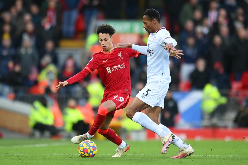 Liverpool forward Kaide Gordon is challenged by Brentford's Ethan Pinnock. Getty Images