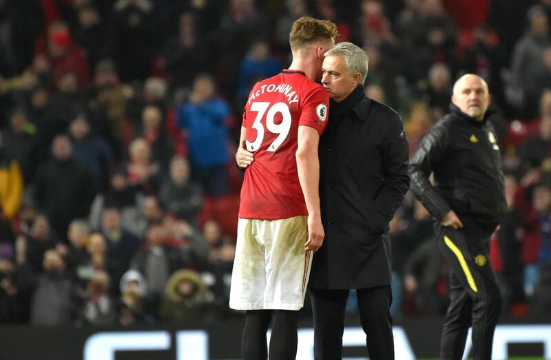 Tottenham manager Jose Mourinho and Manchester United's Scott McTominay. AP Photo