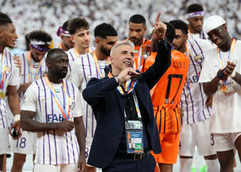 Al Ain manager Hernan Crespo celebrates the win. 