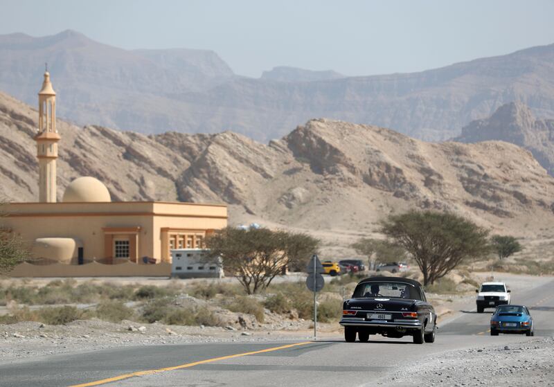 The cars drive through Ras Al Khaimah.
